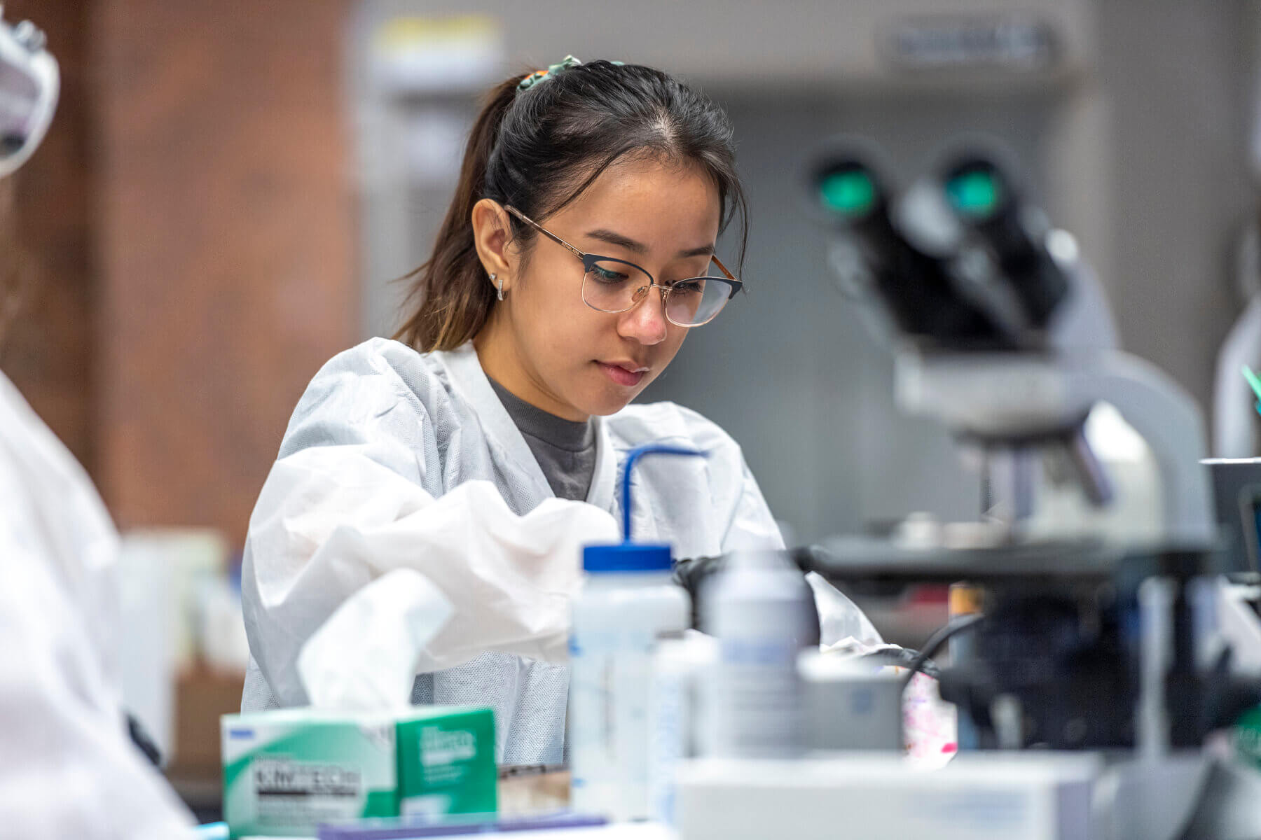 Chemistry student participates in hands on activities in the classroom preparing her for her career.