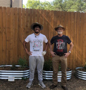 Jose Cornejo and David Turner, Ph.D., pose after completing his project.